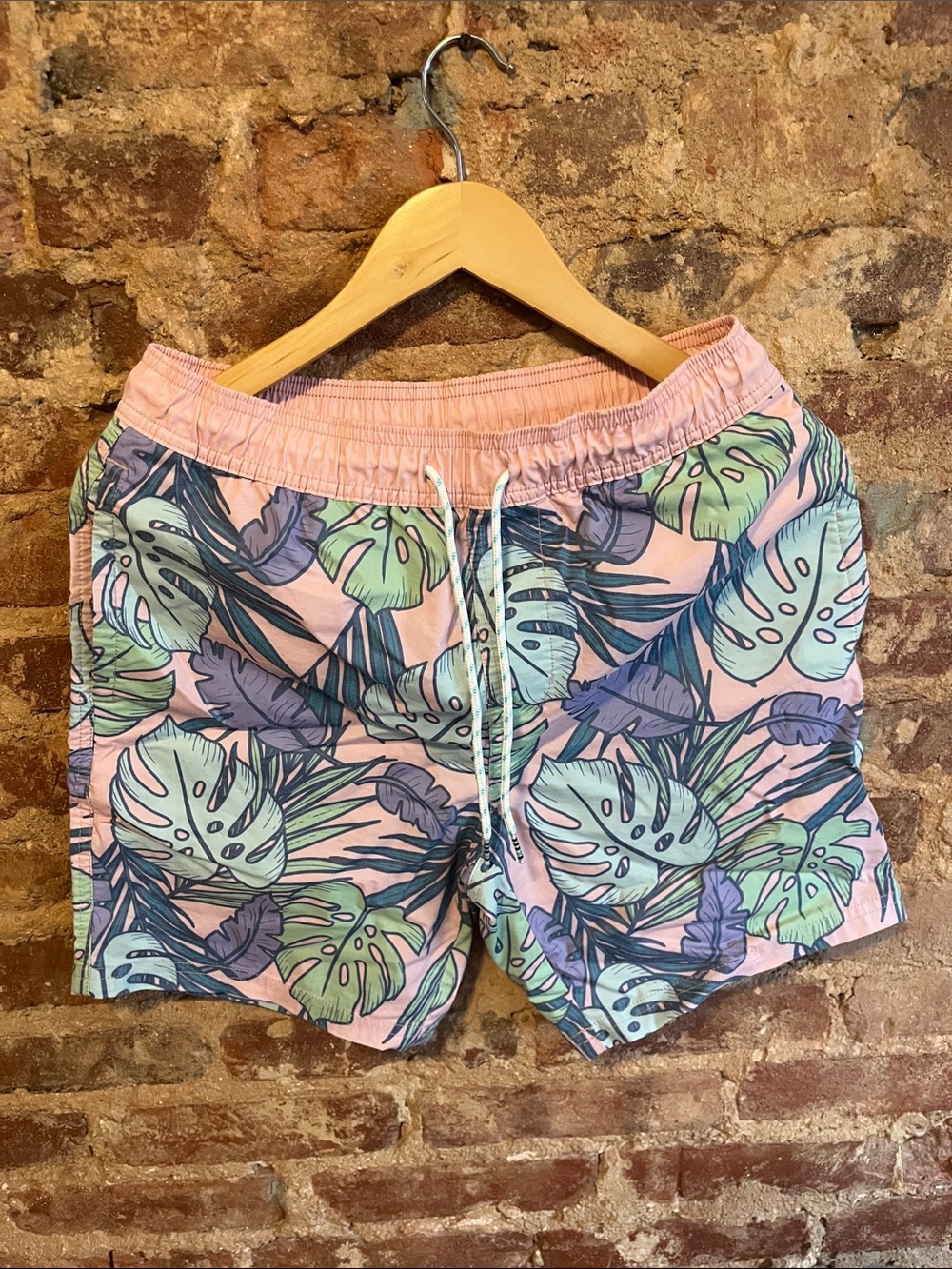 Original Use Pink Tropical Leaf Swim Trunks